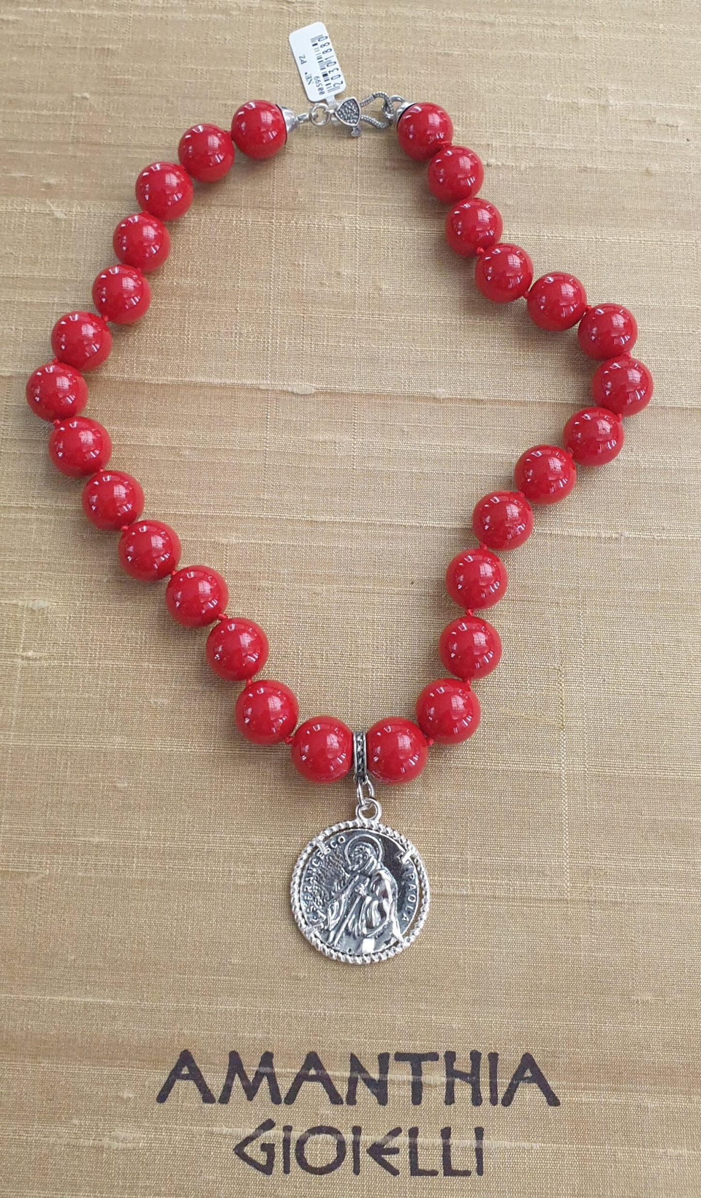 Collana pasta corallo con moneta San Francesco di Paola Amanthia